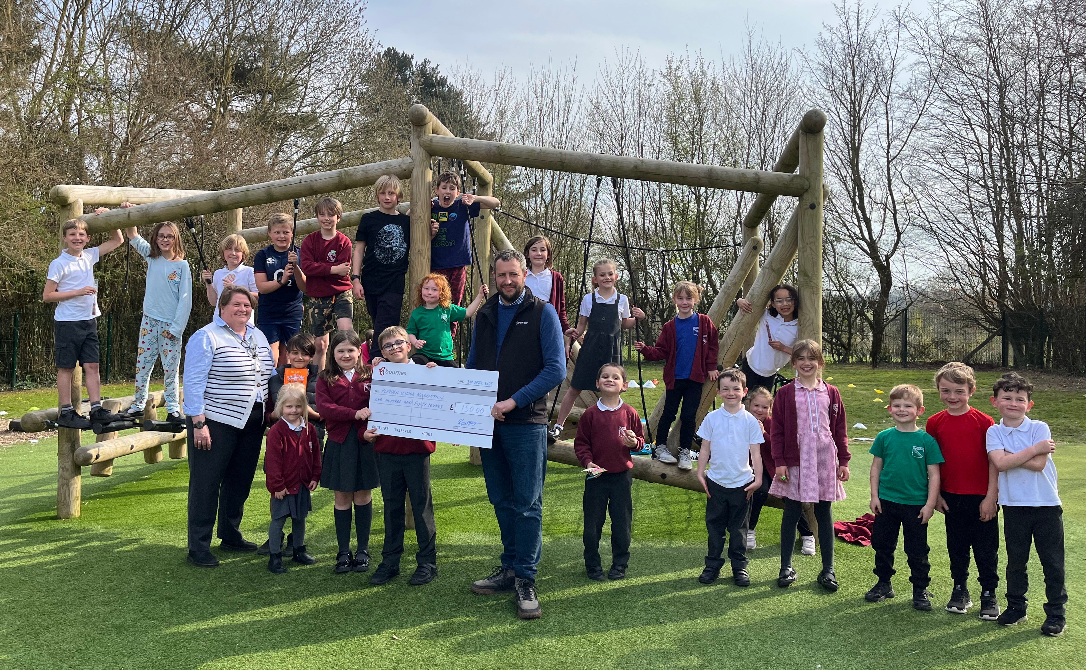 Playden PSA students celebrating winning £150 from local Rye removal company Bournes