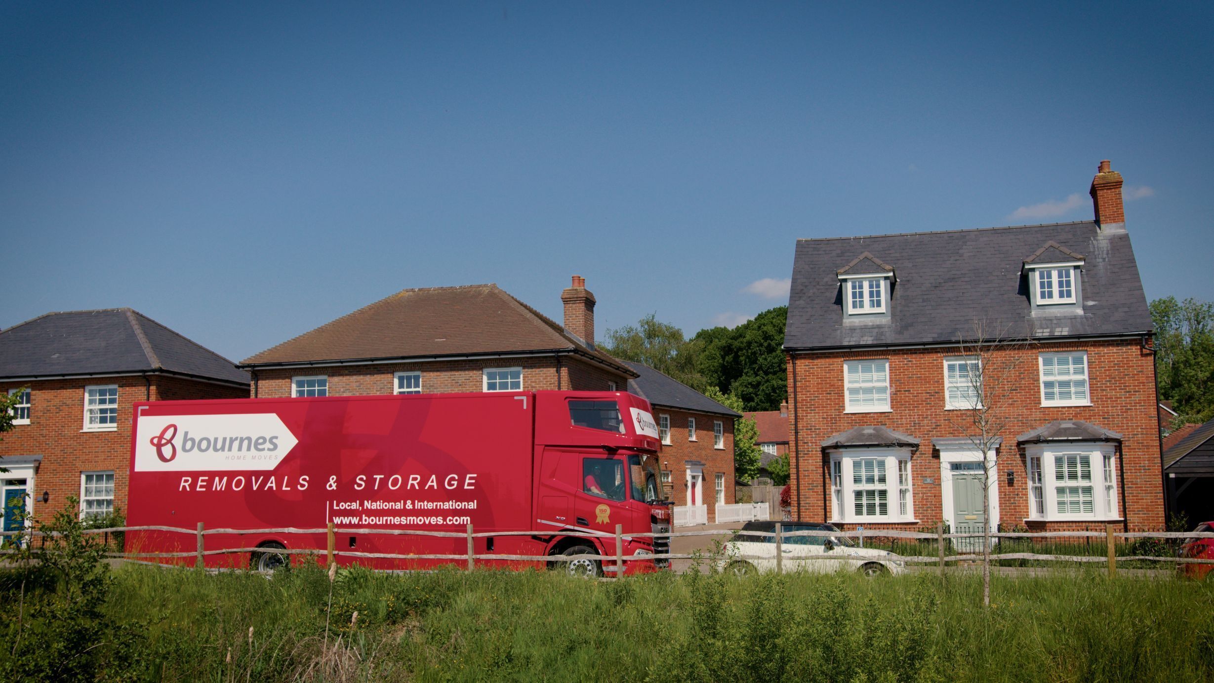 removal company waiting outside a new home on moving day