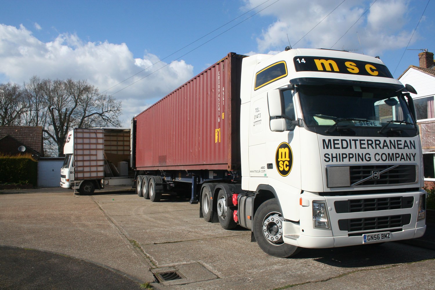 shipping container being loaded for moving from the UK to Australia