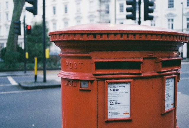 post box uk - Photo by sl wong httpswww.pexels.comphotooblong-brown-metal-mailbox-947384